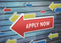 moving red arrow of apply now words on abstract high-tech background